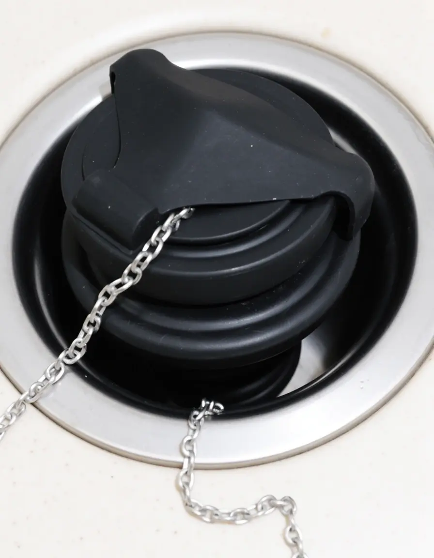 Tapón de fregadero universal de goma negra con cadena